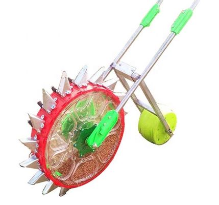 quality  Farm machinery hand push vegetable seeder machine seed planter peanut bean onion seed planter small factory